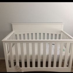 Delta crib convertible to bed with mattress 