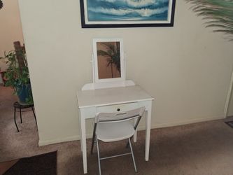 Vanity with chair.