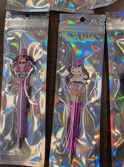 Hello kitty pen/badge reels
