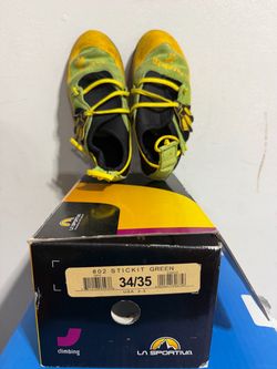 Kid’s climbing shoes and chalk bag