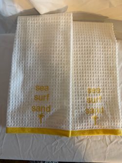 Set of 2 White Waffle Weave Hand Towels with "Sea Surf Sand" Text
