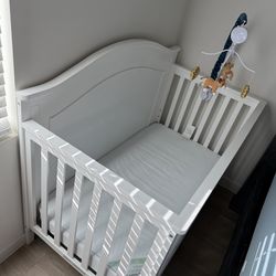 Baby crib with mattress included
