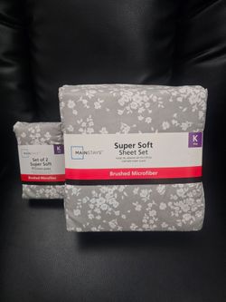 NEW KING SIZE SHEETS AND 4 PILLOW CASES