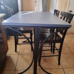 high table with 3 chairs 48x32”37