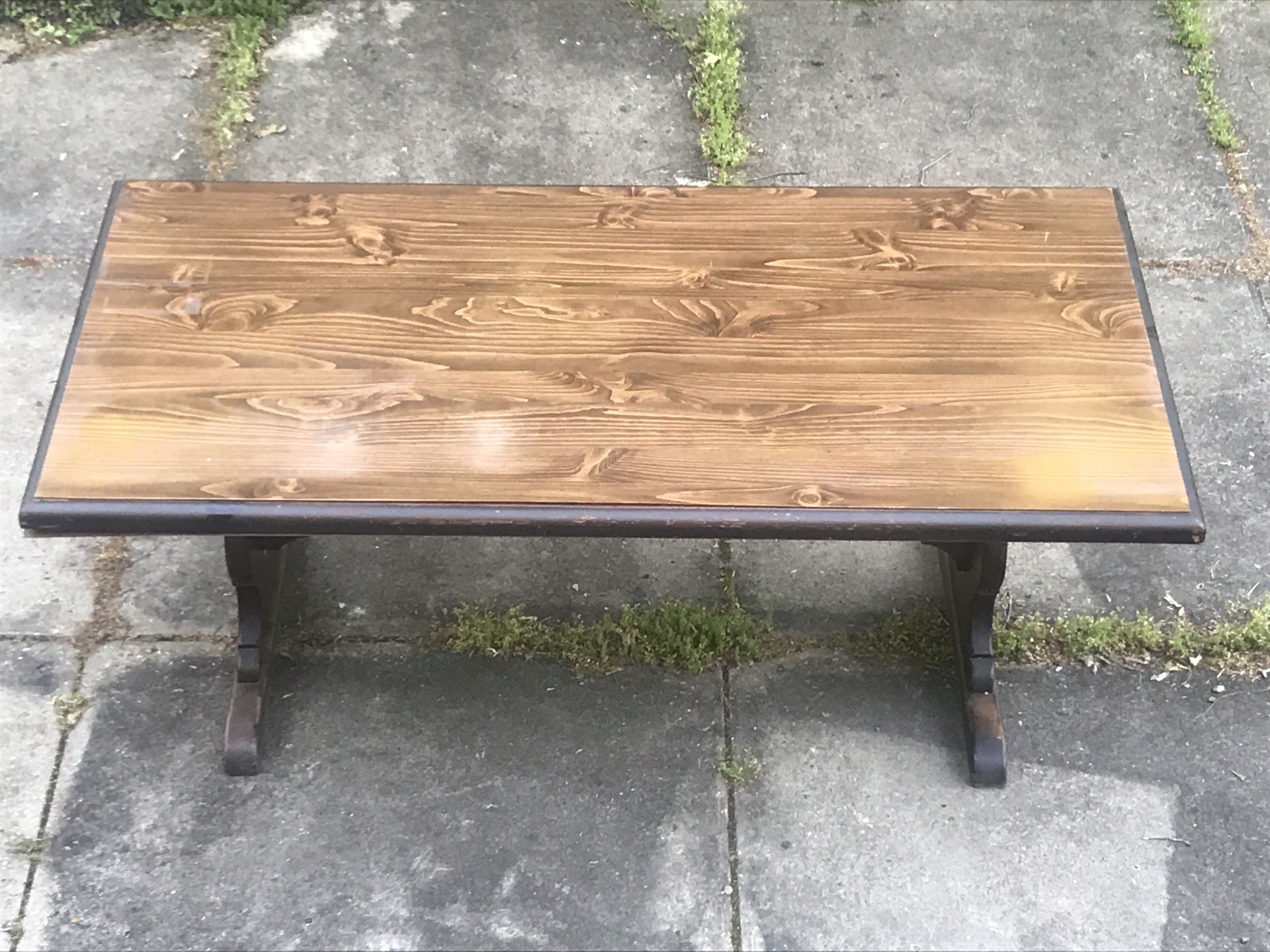 Trestle Dining Room Table, 76”x38”x30”, hardwood table w pine wood base, hardwood tabletop frame, & veneer top. Needs some work to enhance natural be