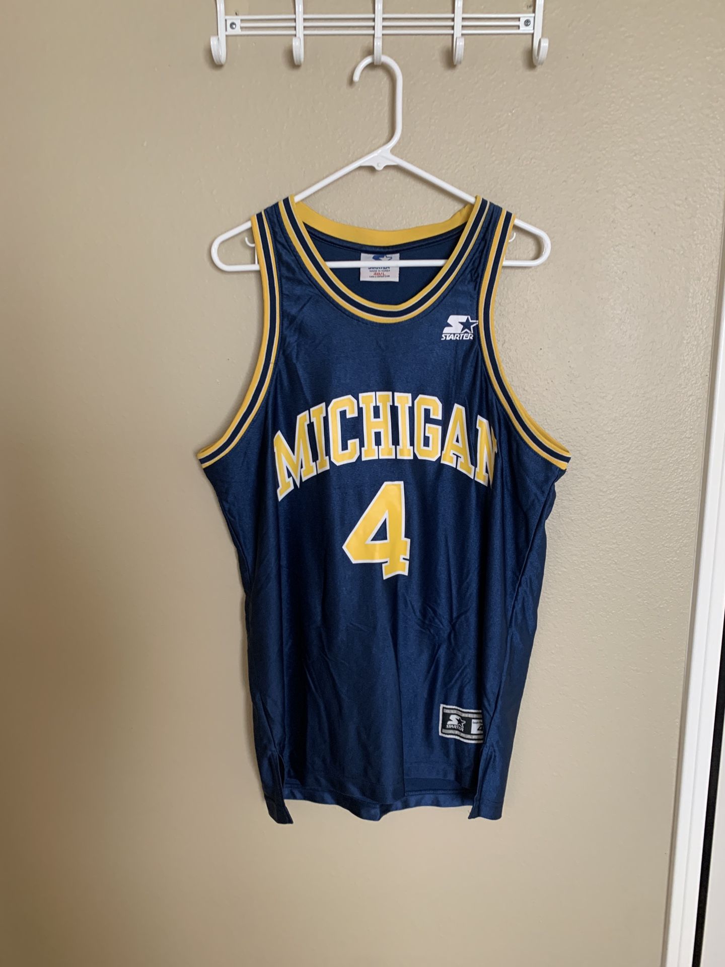 Vintage Starter Michigan Wolverines C. Webber 4 Men Large Jersey. Good Condition