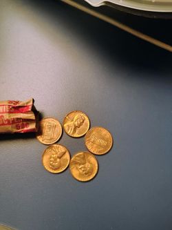 Uncirculated 1966 Lincoln pennies L on rim