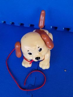 Pull along dog toy