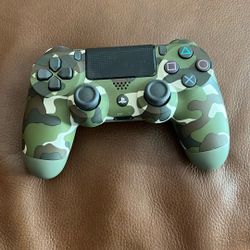 NEW  OUT OF BOX GAMER PLAY STATION CAMO REMOTE CONTROL $50 OBO