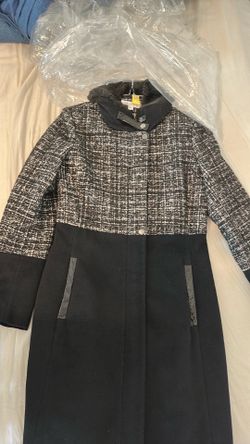 vía spica coat