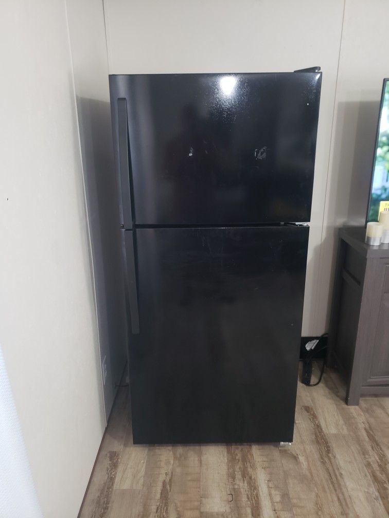 Whirlpool Refrigerator . Needs Freon . Sold As Is!!!