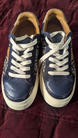 Tory Burch sneakers.
