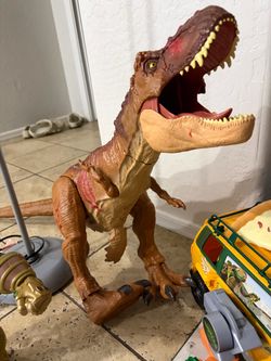 Large Dinosaur Toy and Thanos