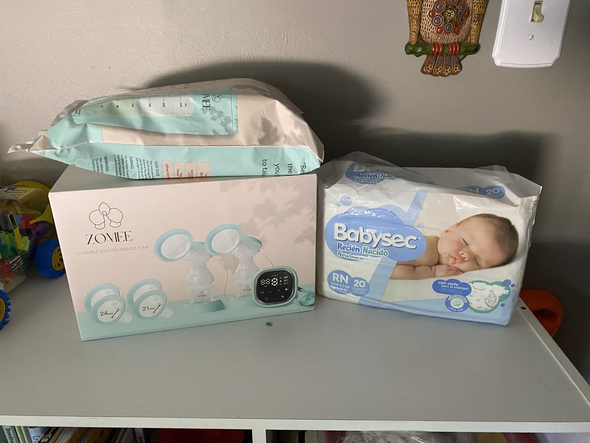 Zomee Pump, Bags, New Born Diapers.