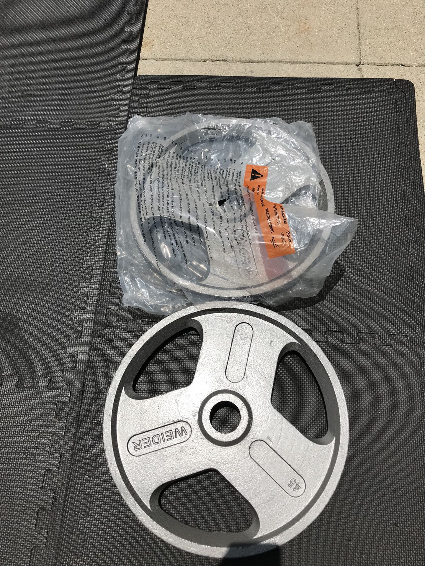 NEW Olympic weights (2x45s) For $70 Firm!!!