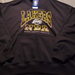 3 team t-shirts and One Lakers hoodie