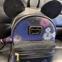 Loungefly Disney WDW 50 Minnie Mouse Fireworks Sequin Backpack Purple and Black