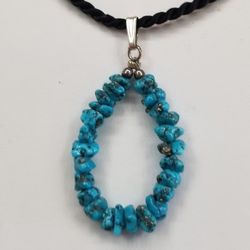 Tourquoise Nugget Pendant On Silk Cord