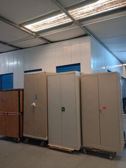 Metal and 1 wood panels storage cabinet with keys