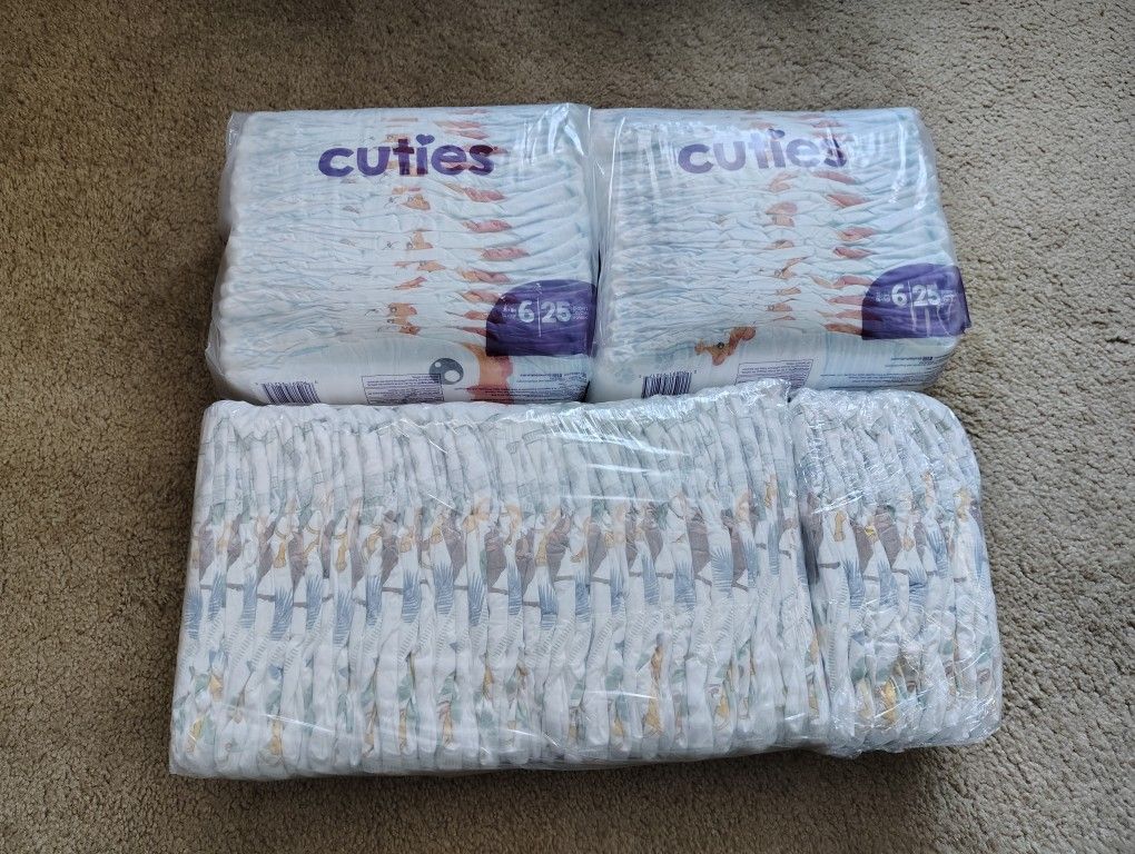 3 New Packs Of Baby Diapers