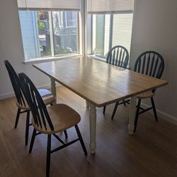 Large wood dining table with 4 chairs