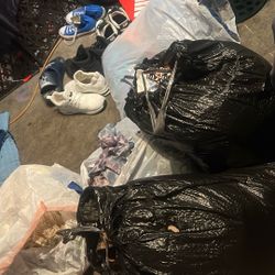 Bags Of Clothes And Jackets