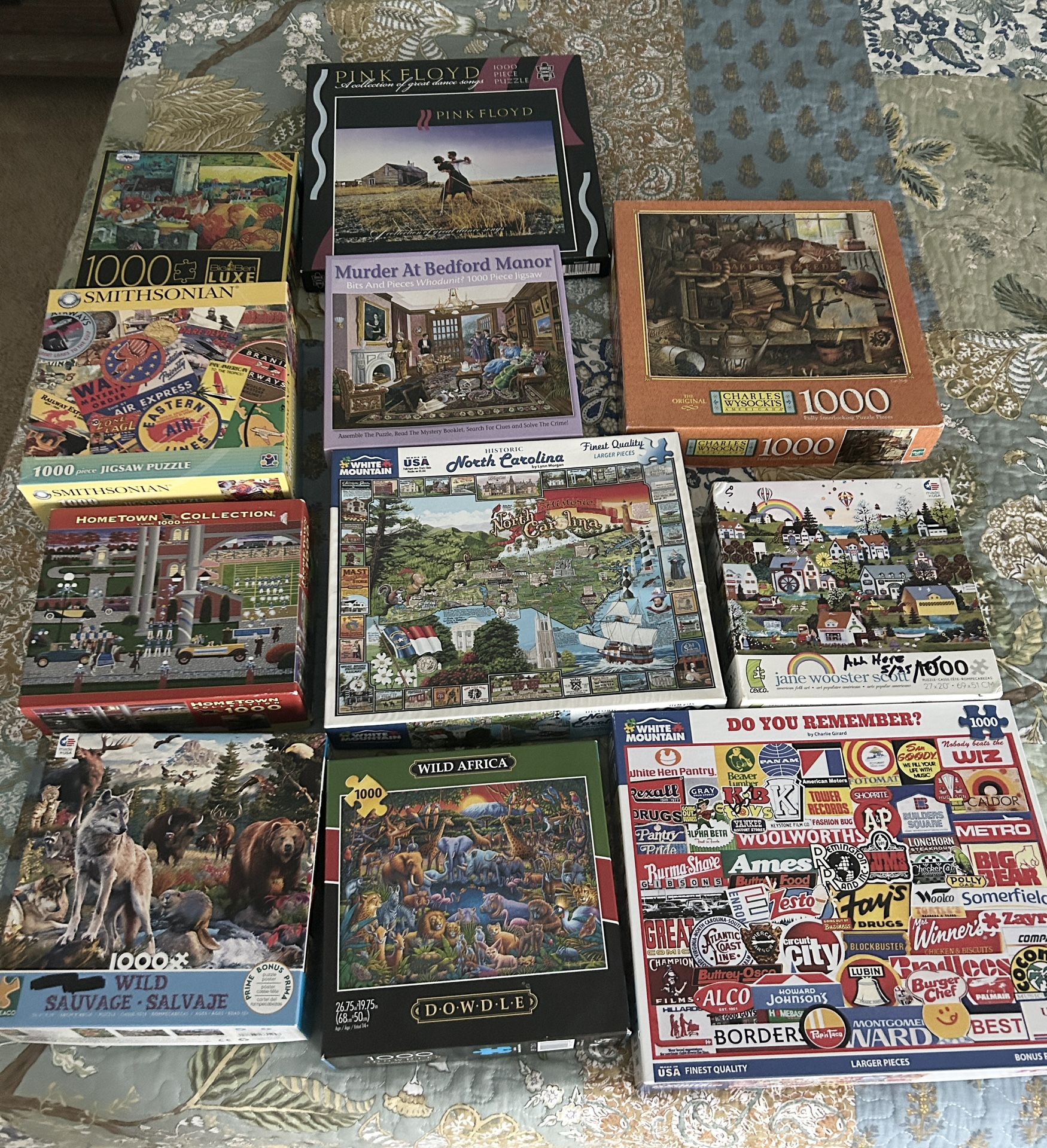 Eleven 1,000 Piece Jigsaw Puzzles