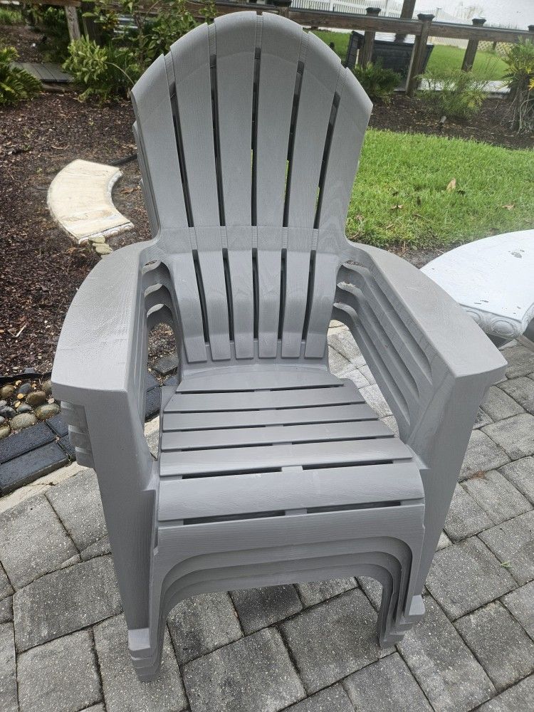 FOUR PATIO GRAY CHAIRS