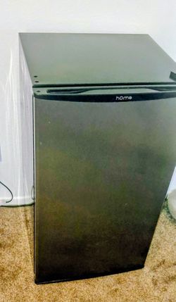 Mini fridge stay in the steel door made by home and it is 3.3 cubic feet for the volume.\n It's in great shape works. Great.