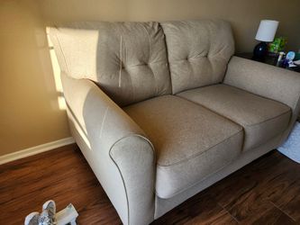 Tan love seat