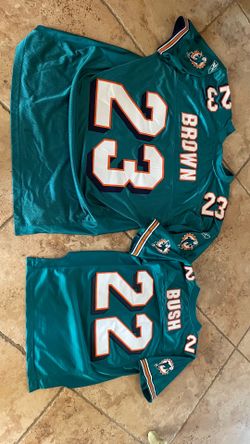 Dolphins  Jerseys #23 size 50, #22 size med. 10-12  $85.00/$65.00 CASH, TEXT FOR PRICES.