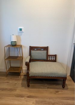 Antique couch. Table stand  Green Lamp.
