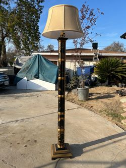 Black/gold colored bamboo style floor lamp 69 inches