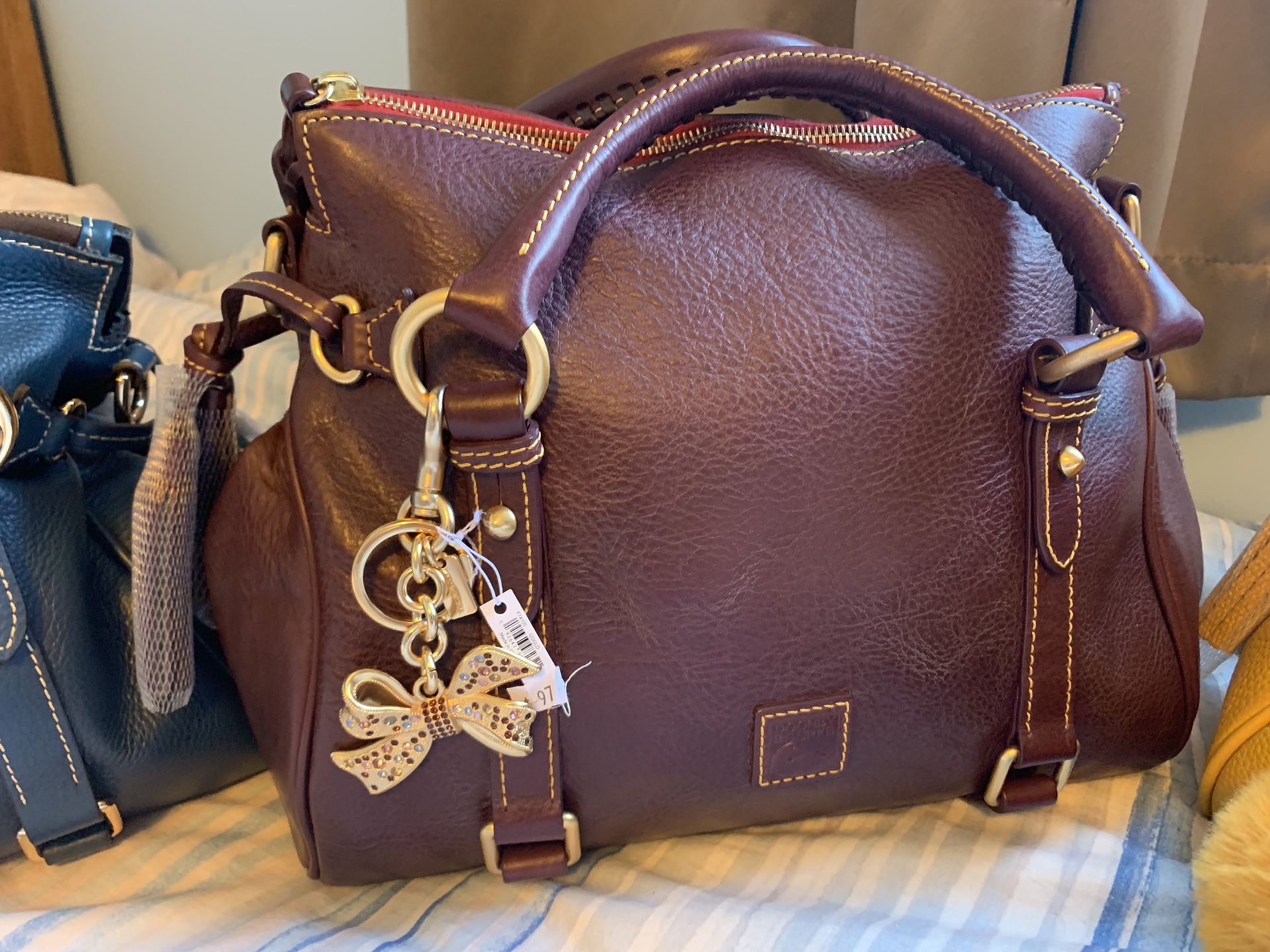 Dooney and Bourke small PLUM Florentine satchel HTW color