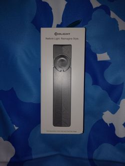 Olight Ark Pro Phantom Flashlight Brand new in sealed Box