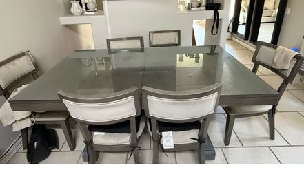 TABLE WITH CHAIRS …STAINS ON THE TABLE AND CHAIRS $0