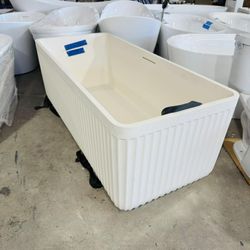 67 in. x 29 in. Acrylic Freestanding Soaking Bathtub in Ivory White $999 