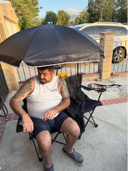 Double chairs with beach umbrella