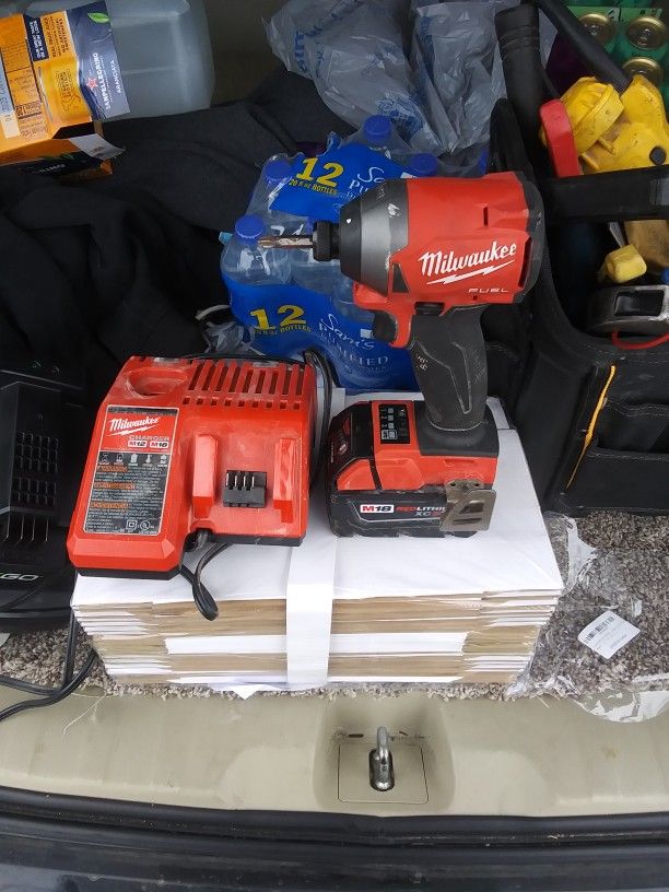 Milwaukee Fuel M18 Impact Drill n Charger