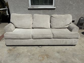 Delivery Available/ Living Spaces Sand Colored Couch sofa