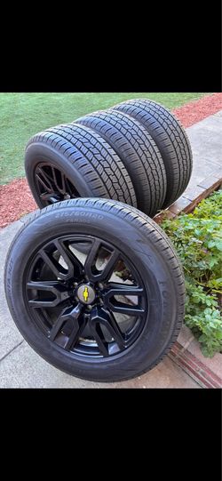 Chevy Silverado stock rims 20 black