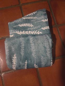12 Shower Curtains Excellent Condition, will sell individually too.  12 for $30 total.