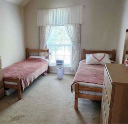 Two Twin XL Solid Wood Bed Frames – Sturdy & Good Condition