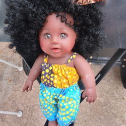 TsiTsi Dhori 13.78" Baby Dolls comes with 1 outfit w/ hair tie. Some assembly is required.