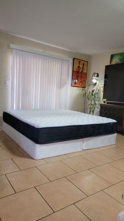VERY NICE LIKE NEW KING SIZE SERTA MATTRESS AND BOXSPRINGS FOR SALE! IN EXCELLENT CONDITION, FREE DELIVERY