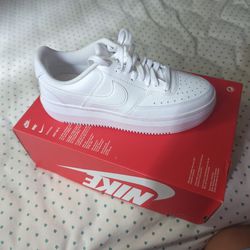 White Nike Shoes.