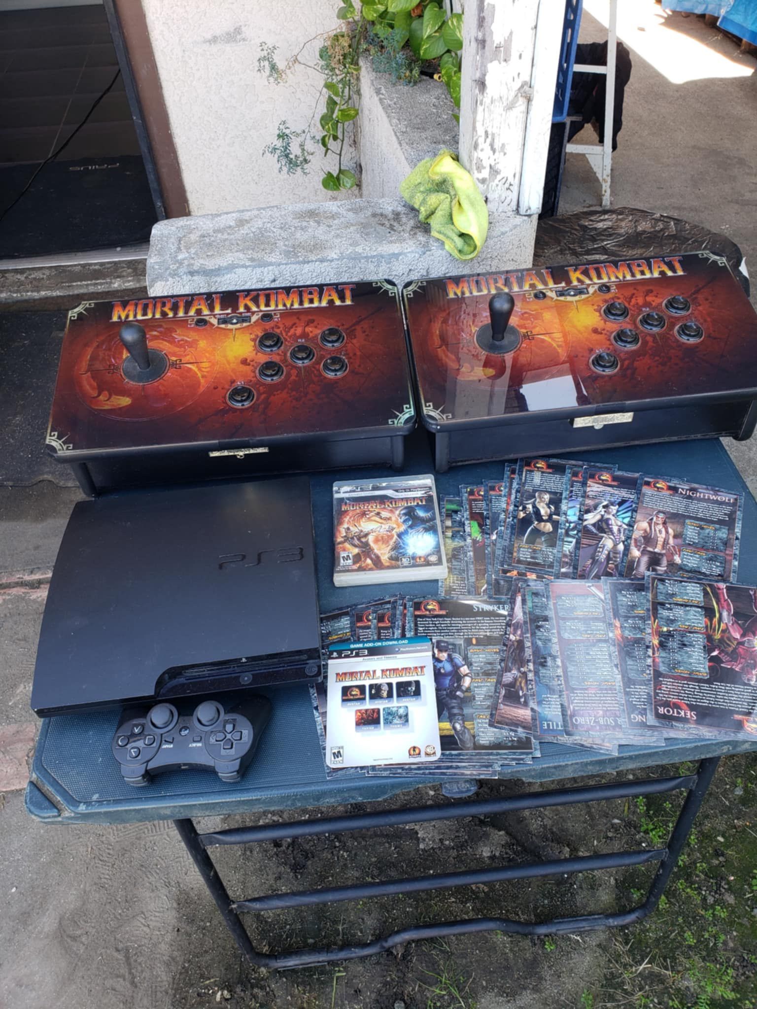 2 Mortal Kombat Arcade Station Tournament brand new Conditions & Playstation 3 Slim PS3 500GB. All Cheat codes & Game included. $650 all or Trade are