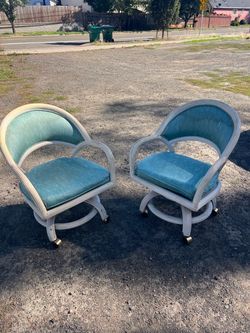 Pair of Rattan Swivel Chairs with Cushions