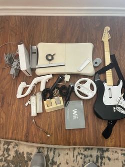 Wii console, games, and accessories bundle