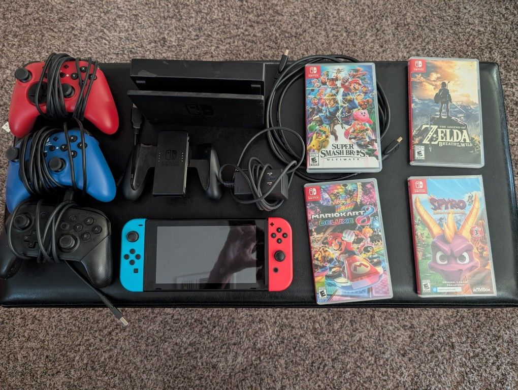 Nintendo Switch With controllers And Games